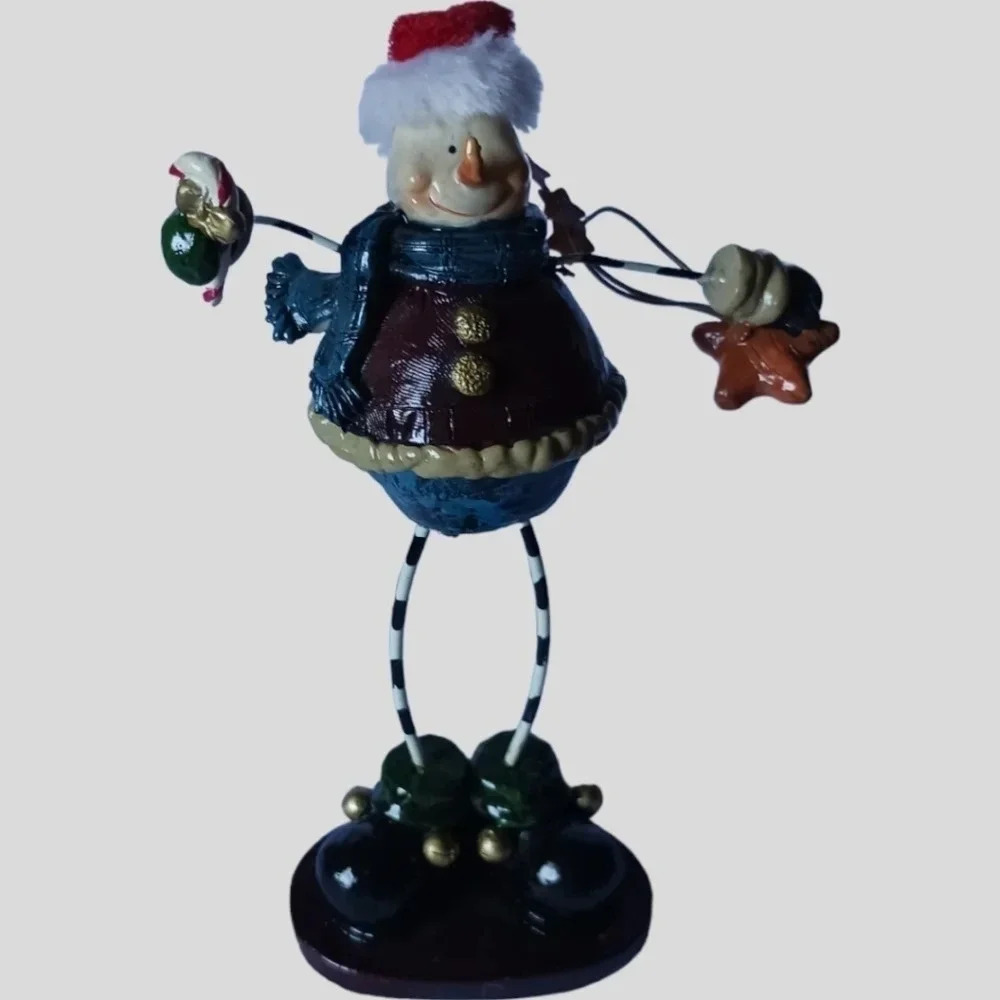 Santa Claus figurine with wire hands and legs